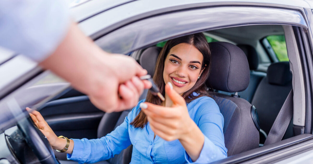Auto business, car sale, transportation, people and ownership concept - close up of car salesman giving key to new owner or customer. Car, New, Buying.