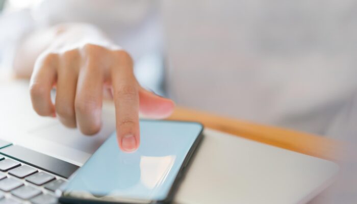 business-hand-with-mobile-phone